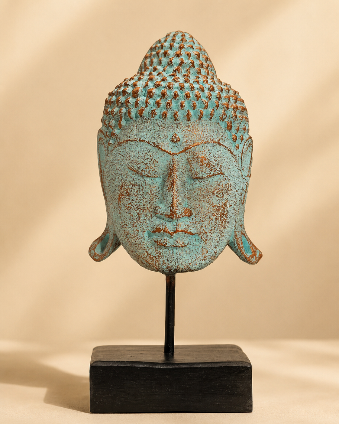 Stort Buddhahuvud på stativ